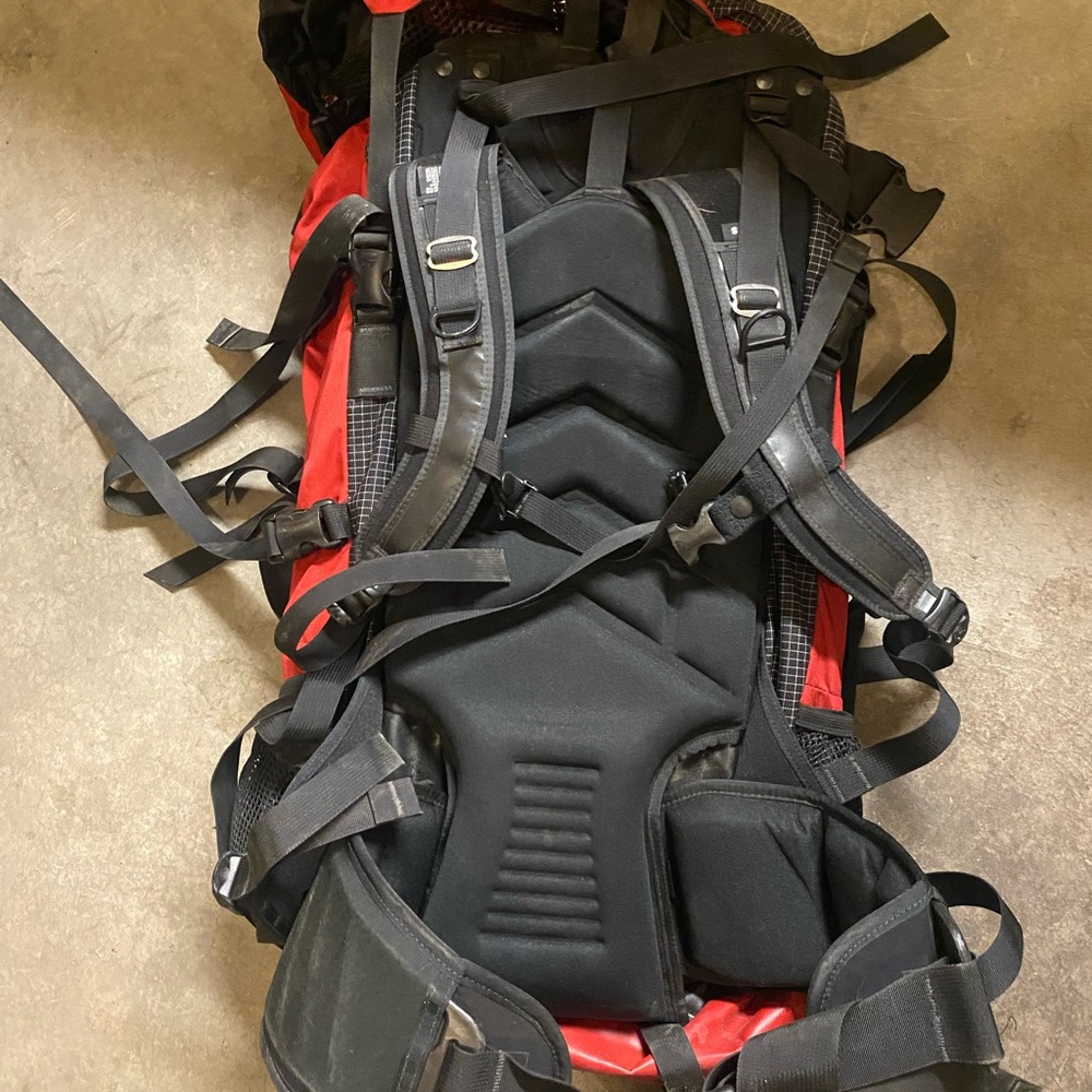 Red and black Gregory Denali pro mountaineering backpack